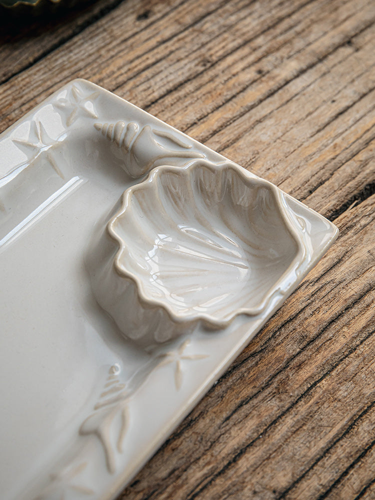 Keramička ploča u obliku školjke