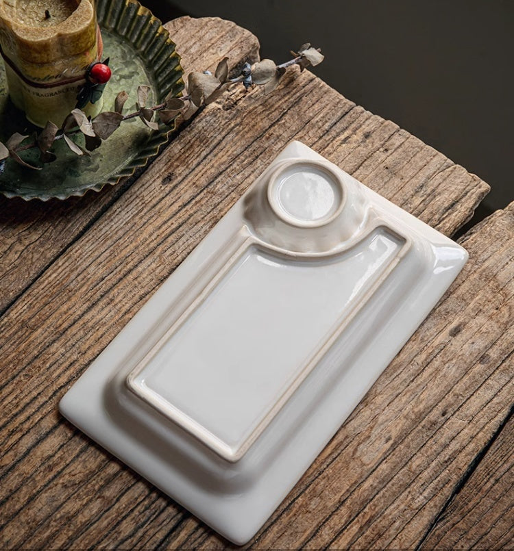 Keramička ploča u obliku školjke